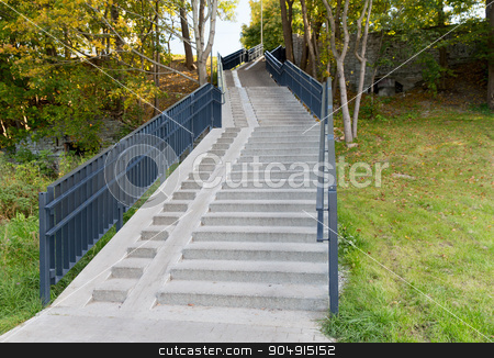 To use this stock image in your creative project, please select the size you need over to the right and click the "Add to Cart" button.
Your downloaded image will come with the Cutcaster watermark removed so don’t worry about the watermark you see on this page. stair case with railings in autumn park stock photo, architecture concept - stair case with railings in autumn park by Syda Productions