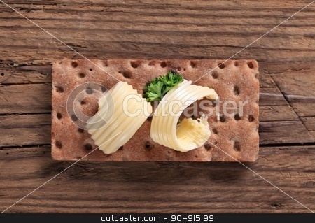 To use this stock image in your creative project, please select the size you need over to the right and click the "Add to Cart" button.
Your downloaded image will come with the Cutcaster watermark removed so don’t worry about the watermark you see on this page. Crisp bread and butter stock photo, Crisp bread and curls of fresh butter by Digifoodstock