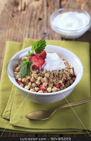 To use this stock image in your creative project, please select the size you need over to the right and click the "Add to Cart" button.
Your downloaded image will come with the Cutcaster watermark removed so don’t worry about the watermark you see on this page. Breakfast cereal with sour cream stock photo, Nut granola with creme Fraiche by Digifoodstock