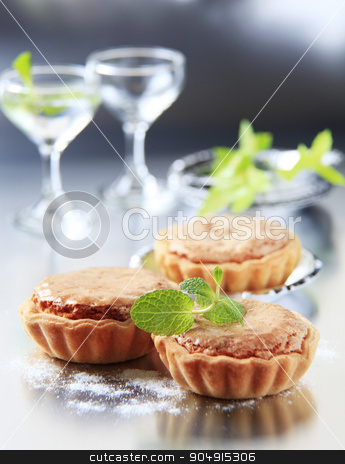 To use this stock image in your creative project, please select the size you need over to the right and click the "Add to Cart" button.
Your downloaded image will come with the Cutcaster watermark removed so don’t worry about the watermark you see on this page. Sweet tartlets stock photo, Sweet tartlets with nut and marzipan filling by Digifoodstock
