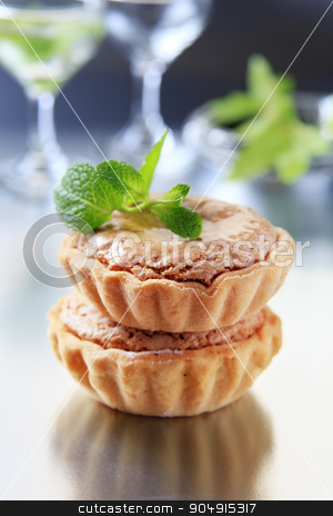 To use this stock image in your creative project, please select the size you need over to the right and click the "Add to Cart" button.
Your downloaded image will come with the Cutcaster watermark removed so don’t worry about the watermark you see on this page. Sweet tartlets stock photo, Sweet tartlets with nut and marzipan filling by Digifoodstock