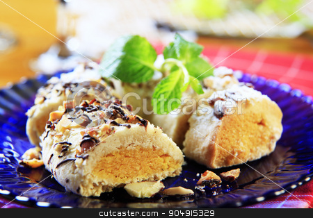 To use this stock image in your creative project, please select the size you need over to the right and click the "Add to Cart" button.
Your downloaded image will come with the Cutcaster watermark removed so don’t worry about the watermark you see on this page. Marzipan crescent cookie stock photo, Marzipan crescent cookie sprinkled with chopped almonds by Digifoodstock