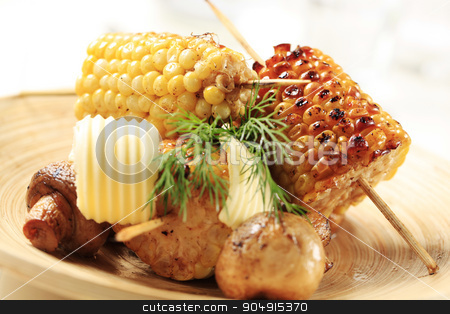 To use this stock image in your creative project, please select the size you need over to the right and click the "Add to Cart" button.
Your downloaded image will come with the Cutcaster watermark removed so don’t worry about the watermark you see on this page. Roasted sweet corn and mushrooms stock photo, Roasted sweet corn cobs and button mushrooms by Digifoodstock