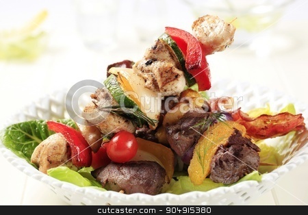 To use this stock image in your creative project, please select the size you need over to the right and click the "Add to Cart" button.
Your downloaded image will come with the Cutcaster watermark removed so don’t worry about the watermark you see on this page. Grilled shish kebabs stock photo, Grilled shish kebabs on lettuce leaves by Digifoodstock