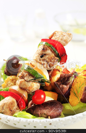 To use this stock image in your creative project, please select the size you need over to the right and click the "Add to Cart" button.
Your downloaded image will come with the Cutcaster watermark removed so don’t worry about the watermark you see on this page. Shish kebabs stock photo, Various types of shish kebabs on lettuce leaves by Digifoodstock