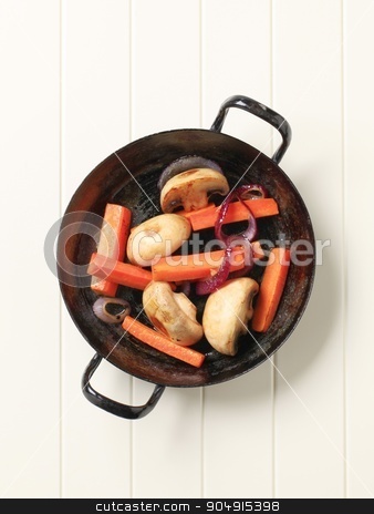 To use this stock image in your creative project, please select the size you need over to the right and click the "Add to Cart" button.
Your downloaded image will come with the Cutcaster watermark removed so don’t worry about the watermark you see on this page. Pan seared vegetables stock photo, Pan seared mushrooms, and strips of carrot by Digifoodstock