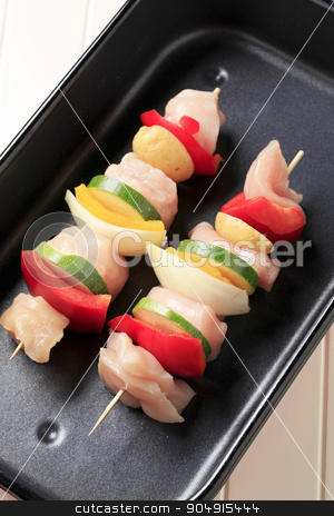 To use this stock image in your creative project, please select the size you need over to the right and click the "Add to Cart" button.
Your downloaded image will come with the Cutcaster watermark removed so don’t worry about the watermark you see on this page. Raw chicken shish kebabs stock photo, Raw chicken shish kebabs in a roasting pan by Digifoodstock