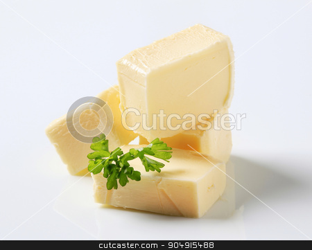 To use this stock image in your creative project, please select the size you need over to the right and click the "Add to Cart" button.
Your downloaded image will come with the Cutcaster watermark removed so don’t worry about the watermark you see on this page. Blocks of butter stock photo, Blocks of fresh butter - studio shot by Digifoodstock