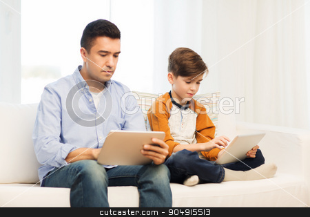 To use this stock image in your creative project, please select the size you need over to the right and click the "Add to Cart" button.
Your downloaded image will come with the Cutcaster watermark removed so don’t worry about the watermark you see on this page. father and son with tablet pc at home stock photo, leisure, technology, technology, family and people concept - father and son with tablet pc computer networking or playing at home by Syda Productions