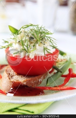 To use this stock image in your creative project, please select the size you need over to the right and click the "Add to Cart" button.
Your downloaded image will come with the Cutcaster watermark removed so don’t worry about the watermark you see on this page. Cheese stuffed tomato stock photo, Cheese stuffed tomato on a slice of bread by Digifoodstock