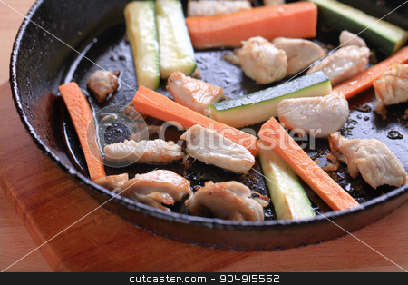 To use this stock image in your creative project, please select the size you need over to the right and click the "Add to Cart" button.
Your downloaded image will come with the Cutcaster watermark removed so don’t worry about the watermark you see on this page. Preparing a chicken stir fry stock photo, Preparing a chicken stir fry - detail by Digifoodstock