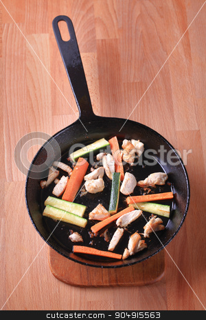 To use this stock image in your creative project, please select the size you need over to the right and click the "Add to Cart" button.
Your downloaded image will come with the Cutcaster watermark removed so don’t worry about the watermark you see on this page. Preparing a chicken stir fry stock photo, Preparing a chicken stir fry - closeup by Digifoodstock