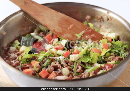 To use this stock image in your creative project, please select the size you need over to the right and click the "Add to Cart" button.
Your downloaded image will come with the Cutcaster watermark removed so don’t worry about the watermark you see on this page. Meat-based pasta sauce stock photo, Preparing meat based pasta sauce - detail by Digifoodstock