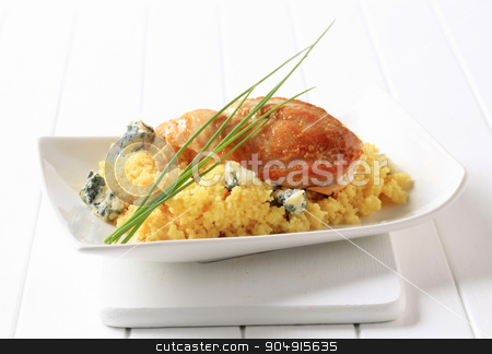 To use this stock image in your creative project, please select the size you need over to the right and click the "Add to Cart" button.
Your downloaded image will come with the Cutcaster watermark removed so don’t worry about the watermark you see on this page. Chicken and couscous stock photo, Roast chicken breast served with couscous and blue cheese by Digifoodstock