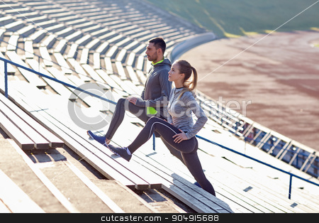 To use this stock image in your creative project, please select the size you need over to the right and click the "Add to Cart" button.
Your downloaded image will come with the Cutcaster watermark removed so don’t worry about the watermark you see on this page. couple stretching leg on stands of stadium stock photo, fitness, sport, exercising and lifestyle concept - couple stretching leg on stands of stadium by Syda Productions