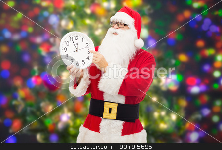 To use this stock image in your creative project, please select the size you need over to the right and click the "Add to Cart" button.
Your downloaded image will come with the Cutcaster watermark removed so don’t worry about the watermark you see on this page. man in costume of santa claus with clock stock photo, christmas, holidays, time and people concept - man in costume of santa claus with clock showing twelve over party lights background by Syda Productions