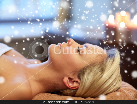 To use this stock image in your creative project, please select the size you need over to the right and click the "Add to Cart" button.
Your downloaded image will come with the Cutcaster watermark removed so don’t worry about the watermark you see on this page. close up of smiling young woman lying in spa salon stock photo, people, beauty, spa, winter and relaxation concept - close up of beautiful smiling young woman lying with closed eyes in spa salon with snow effect by Syda Productions