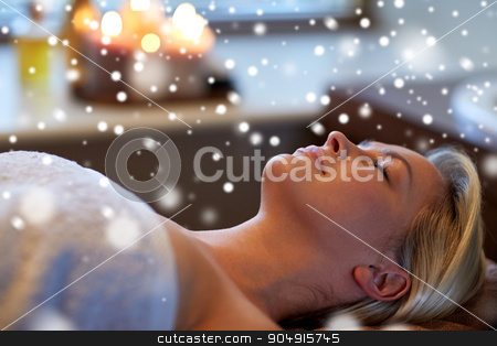 To use this stock image in your creative project, please select the size you need over to the right and click the "Add to Cart" button.
Your downloaded image will come with the Cutcaster watermark removed so don’t worry about the watermark you see on this page. close up of smiling young woman lying in spa salon stock photo, people, beauty, spa, winter and relaxation concept - close up of beautiful smiling young woman lying with closed eyes in spa salon with snow effect by Syda Productions