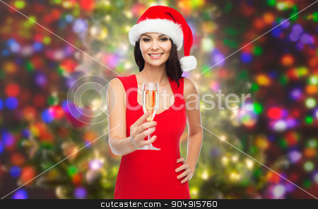 To use this stock image in your creative project, please select the size you need over to the right and click the "Add to Cart" button.
Your downloaded image will come with the Cutcaster watermark removed so don’t worry about the watermark you see on this page. beautiful sexy woman in santa hat and red dress stock photo, people, holidays, christmas and celebration concept - beautiful sexy woman in santa hat and red dress with champagne glass over party lights background by Syda Productions