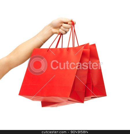 To use this stock image in your creative project, please select the size you need over to the right and click the "Add to Cart" button.
Your downloaded image will come with the Cutcaster watermark removed so don’t worry about the watermark you see on this page. close up of hand holding red shopping bags stock photo, people, sale, consumerism, advertisement and commerce concept - close up of hand holding red blank shopping bags by Syda Productions