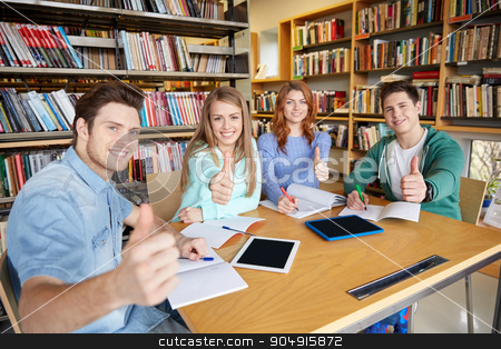 To use this stock image in your creative project, please select the size you need over to the right and click the "Add to Cart" button.
Your downloaded image will come with the Cutcaster watermark removed so don’t worry about the watermark you see on this page. happy students showing thumbs up in school library stock photo, people, knowledge, education and school concept - group of happy students with tablet pc computers showing thumbs up in library by Syda Productions