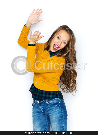 To use this stock image in your creative project, please select the size you need over to the right and click the "Add to Cart" button.
Your downloaded image will come with the Cutcaster watermark removed so don’t worry about the watermark you see on this page. happy young woman or teen girl applauding stock photo, people, style and fashion concept - happy young woman or teen girl in casual clothes having fun and applauding by Syda Productions