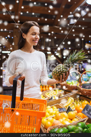 To use this stock image in your creative project, please select the size you need over to the right and click the "Add to Cart" button.
Your downloaded image will come with the Cutcaster watermark removed so don’t worry about the watermark you see on this page. happy young woman with food basket in market stock photo, sale, shopping, consumerism and people concept - happy young woman with food basket in market over snow effect by Syda Productions