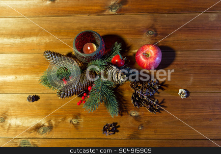 To use this stock image in your creative project, please select the size you need over to the right and click the "Add to Cart" button.
Your downloaded image will come with the Cutcaster watermark removed so don’t worry about the watermark you see on this page. christmas fir branch decoration and candle lantern stock photo, christmas, decoration, holidays and new year concept - close up of natural fir branch decoration and fir-cone and candle in lantern on wooden table by Syda Productions