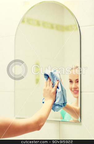 To use this stock image in your creative project, please select the size you need over to the right and click the "Add to Cart" button.
Your downloaded image will come with the Cutcaster watermark removed so don’t worry about the watermark you see on this page. close up of happy woman cleaning mirror with rag stock photo, people, housework and housekeeping concept - close up of happy woman cleaning mirror with rag at home by Syda Productions