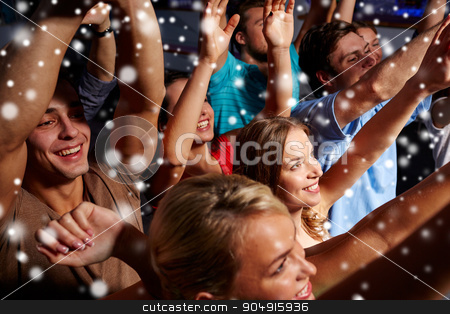 To use this stock image in your creative project, please select the size you need over to the right and click the "Add to Cart" button.
Your downloaded image will come with the Cutcaster watermark removed so don’t worry about the watermark you see on this page. group of smiling friends at concert in club stock photo, party, holidays, celebration, nightlife and people concept - group of smiling friends waving hands at concert in club and snow effect by Syda Productions