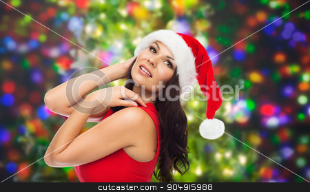 To use this stock image in your creative project, please select the size you need over to the right and click the "Add to Cart" button.
Your downloaded image will come with the Cutcaster watermark removed so don’t worry about the watermark you see on this page. beautiful sexy woman in santa hat and red dress stock photo, people, holidays, christmas and celebration concept - beautiful sexy woman in santa hat and red dress over party lights background by Syda Productions