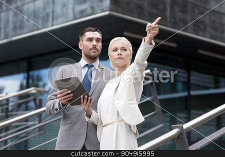 To use this stock image in your creative project, please select the size you need over to the right and click the "Add to Cart" button.
Your downloaded image will come with the Cutcaster watermark removed so don’t worry about the watermark you see on this page. serious businessmen with tablet pc outdoors stock photo, business, partnership, technology and people concept - serious businessman and businesswoman with tablet pc computer over office building by Syda Productions