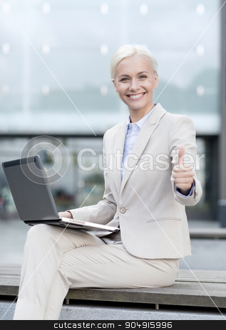 To use this stock image in your creative project, please select the size you need over to the right and click the "Add to Cart" button.
Your downloaded image will come with the Cutcaster watermark removed so don’t worry about the watermark you see on this page. smiling businesswoman working with laptop outdoors stock photo, business, education, technology and people concept - smiling businesswoman working with laptop computer on city street by Syda Productions