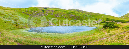 To use this stock image in your creative project, please select the size you need over to the right and click the "Add to Cart" button.
Your downloaded image will come with the Cutcaster watermark removed so don’t worry about the watermark you see on this page. landscape of the Lake Nesamovyte stock photo, landscape of the Lake Nesamovyte in Carpathians by MegaArt