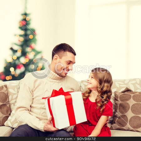 To use this stock image in your creative project, please select the size you need over to the right and click the "Add to Cart" button.
Your downloaded image will come with the Cutcaster watermark removed so don’t worry about the watermark you see on this page. smiling father and daughter looking at each other stock photo, family, christmas, x-mas, winter, happiness and people concept - smiling father and daughter holding gift box and looking at each other by Syda Productions