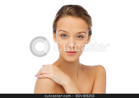 To use this stock image in your creative project, please select the size you need over to the right and click the "Add to Cart" button.
Your downloaded image will come with the Cutcaster watermark removed so don’t worry about the watermark you see on this page. smiling young woman face and shoulders stock photo, beauty, people, body care and health concept - smiling young woman face and hand on bare shoulder by Syda Productions