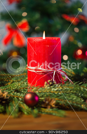 To use this stock image in your creative project, please select the size you need over to the right and click the "Add to Cart" button.
Your downloaded image will come with the Cutcaster watermark removed so don’t worry about the watermark you see on this page. fir branch wreath with candle on wooden table stock photo, christmas, decoration, holidays and advertisement concept - close up of natural green fir branch wreath with red burning candle on wooden board by Syda Productions