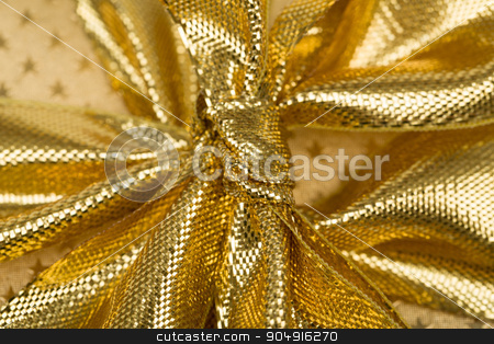 To use this stock image in your creative project, please select the size you need over to the right and click the "Add to Cart" button.
Your downloaded image will come with the Cutcaster watermark removed so don’t worry about the watermark you see on this page. detail of golden ribbon stock photo, close up detail of golden ribbon on luxury gift by Artush