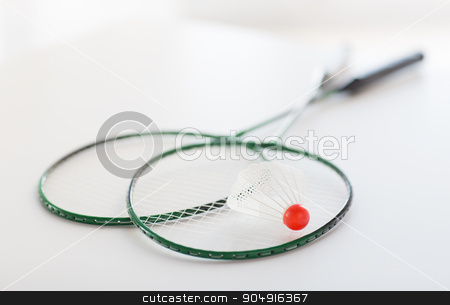 To use this stock image in your creative project, please select the size you need over to the right and click the "Add to Cart" button.
Your downloaded image will come with the Cutcaster watermark removed so don’t worry about the watermark you see on this page. close up of badminton rackets with shuttlecock stock photo, sport, fitness, healthy lifestyle and objects concept - close up of badminton rackets with shuttlecock by Syda Productions