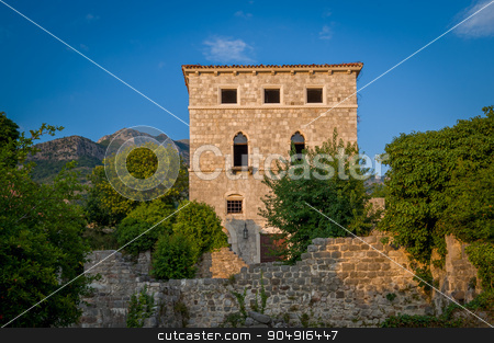 To use this stock image in your creative project, please select the size you need over to the right and click the "Add to Cart" button.
Your downloaded image will come with the Cutcaster watermark removed so don’t worry about the watermark you see on this page. Historical museum of Old Bar town stock photo, Ancient fortress ruins and ethnographic museum building of Old Town Bar, Montenegro by Alexander Nikiforov