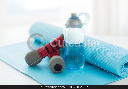 To use this stock image in your creative project, please select the size you need over to the right and click the "Add to Cart" button.
Your downloaded image will come with the Cutcaster watermark removed so don’t worry about the watermark you see on this page. close up of bottle, dumbbells and sports mat stock photo, sport, fitness, healthy lifestyle and objects concept - close up of bottle with water, dumbbells and sports mat by Syda Productions