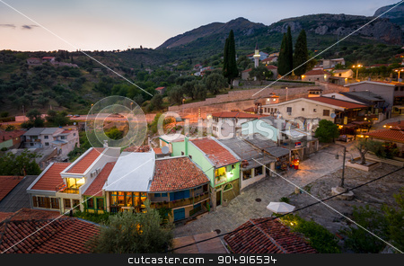 To use this stock image in your creative project, please select the size you need over to the right and click the "Add to Cart" button.
Your downloaded image will come with the Cutcaster watermark removed so don’t worry about the watermark you see on this page. Old Bar touristic shops street view from fortress tower stock photo, Touristic street of Old Bar late evening view from medieval fortress tower. Bar, Montenegro by Alexander Nikiforov