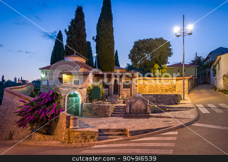 To use this stock image in your creative project, please select the size you need over to the right and click the "Add to Cart" button.
Your downloaded image will come with the Cutcaster watermark removed so don’t worry about the watermark you see on this page. Old Bar night streets stock photo, Old Bar night street view with stone mosque entrance buildings at touristic center of a town. Bar, Montenegro by Alexander Nikiforov