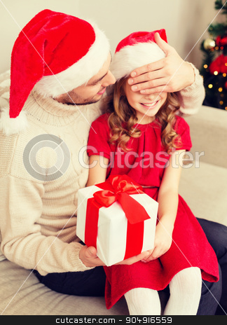 To use this stock image in your creative project, please select the size you need over to the right and click the "Add to Cart" button.
Your downloaded image will come with the Cutcaster watermark removed so don’t worry about the watermark you see on this page. smiling father surprises daughter with gift box stock photo, family, christmas, x-mas, winter, happiness and people concept - smiling father surprise daughter with gift box covering eyes with hand by Syda Productions