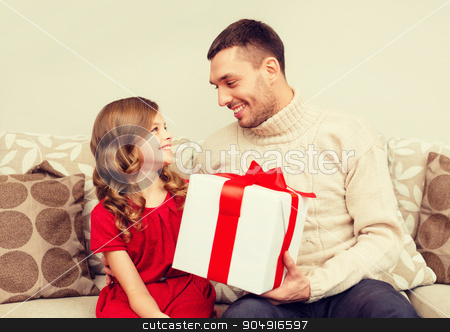 To use this stock image in your creative project, please select the size you need over to the right and click the "Add to Cart" button.
Your downloaded image will come with the Cutcaster watermark removed so don’t worry about the watermark you see on this page. smiling father and daughter looking at each other stock photo, christmas, x-mas, winter, happiness and people concept - smiling father and daughter holding gift box and looking at each other by Syda Productions