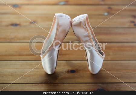 To use this stock image in your creative project, please select the size you need over to the right and click the "Add to Cart" button.
Your downloaded image will come with the Cutcaster watermark removed so don’t worry about the watermark you see on this page. close up of pointe shoes on wooden floor stock photo, ballet, footwear and objects concept - close up of pointe shoes on wooden floor by Syda Productions