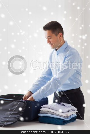To use this stock image in your creative project, please select the size you need over to the right and click the "Add to Cart" button.
Your downloaded image will come with the Cutcaster watermark removed so don’t worry about the watermark you see on this page. businessman packing clothes into travel bag stock photo, business, trip, luggage and people concept - happy businessman packing clothes into travel bag over snow effect by Syda Productions