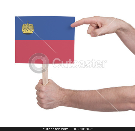 To use this stock image in your creative project, please select the size you need over to the right and click the "Add to Cart" button.
Your downloaded image will come with the Cutcaster watermark removed so don’t worry about the watermark you see on this page. Hand holding small card - Flag of Liechtenstein stock photo, Hand holding small card, isolated on white - Flag of Liechtenstein by michaklootwijk