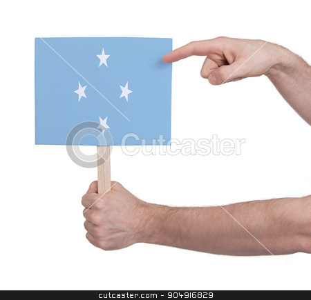 To use this stock image in your creative project, please select the size you need over to the right and click the "Add to Cart" button.
Your downloaded image will come with the Cutcaster watermark removed so don’t worry about the watermark you see on this page. Hand holding small card - Flag of Micronesia stock photo, Hand holding small card, isolated on white - Flag of Micronesia by michaklootwijk