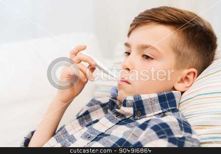 To use this stock image in your creative project, please select the size you need over to the right and click the "Add to Cart" button.
Your downloaded image will come with the Cutcaster watermark removed so don’t worry about the watermark you see on this page. ill boy with flu and thermometer at home stock photo, childhood, healthcare and medicine concept - ill boy with flu measuring temperature by thermometer at home by Syda Productions